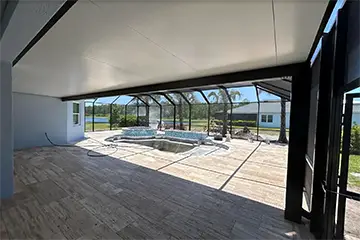 Pool enclosure with elite insulated patio cover roof